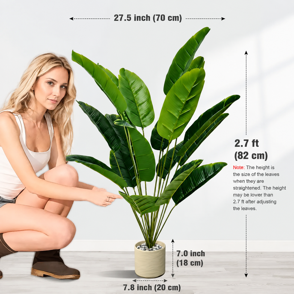 Size guide for an 18 leaf artificial banana tree showing 2.7 ft or 82 cm height and 27.5 inch canopy width beside a model