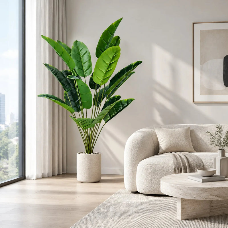 18-leaf faux banana tree with real-touch silk leaves styled in a bright living room corner